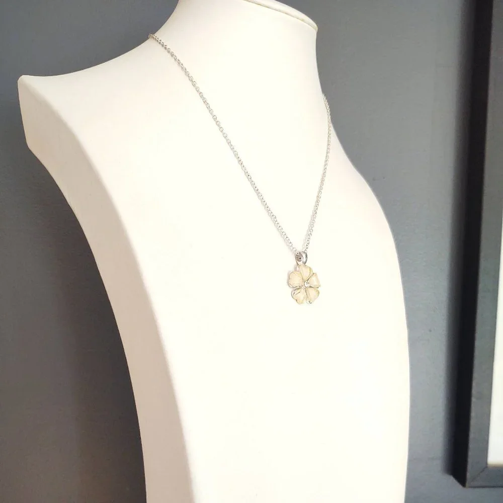 Cream flower pendant necklace with cz center and silver accents